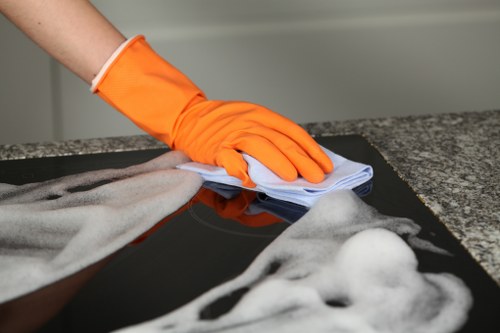 Local technician cleaning stairs and hallway carpets in W5