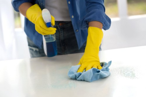 Detailed post construction cleaning of kitchen surfaces and cupboards